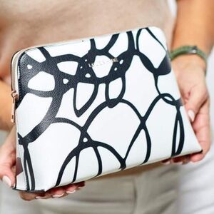 LOUENHIDE Bardot Swirl Case cream black rose gold tone hardware interior lined